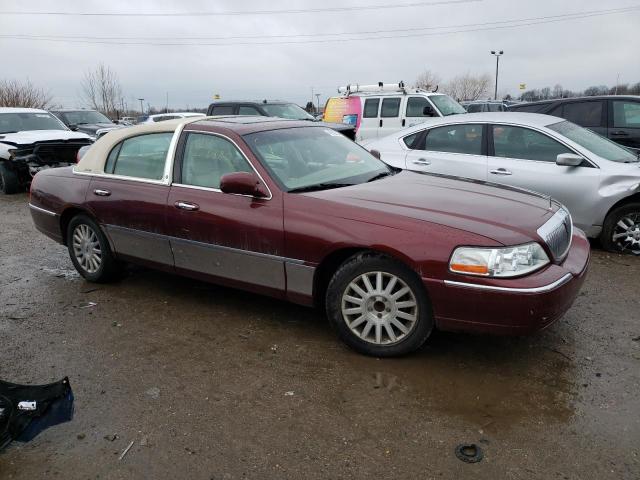 Photo 4 from auction – 2004 LINCOLN TOWN CAR E with VIN 1LNHM81W24Y609988