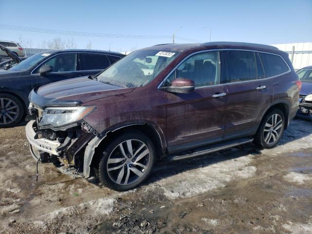 HONDA PILOT TOUR 2016 with VIN 5FNYF6H91GB505578 - Photo from auction