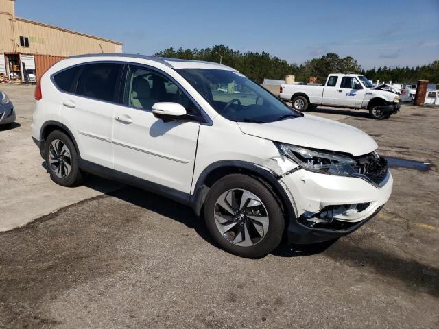 Photo 4 from auction – 2016 HONDA CR-V TOURI with VIN 5J6RM3H97GL025691