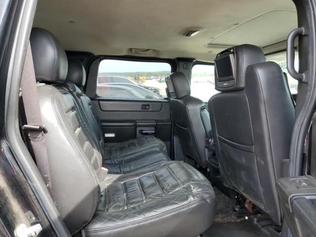 Photo 11 from auction – 2006 HUMMER H2 with VIN 5GRGN23U36H116456