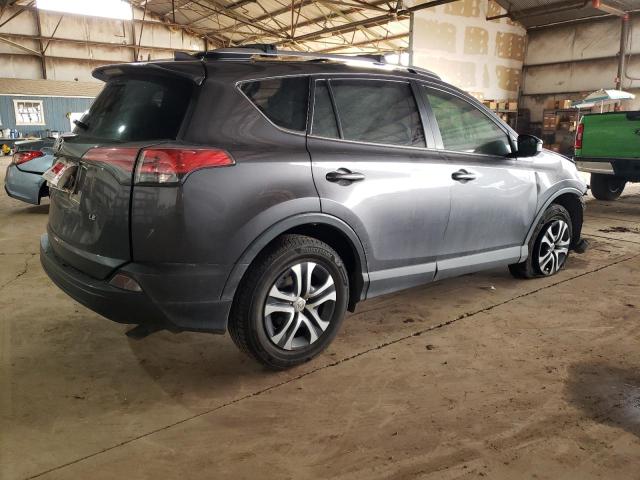 Photo 3 from auction – 2018 TOYOTA RAV4 LE with VIN JTMZFREVXJJ722473