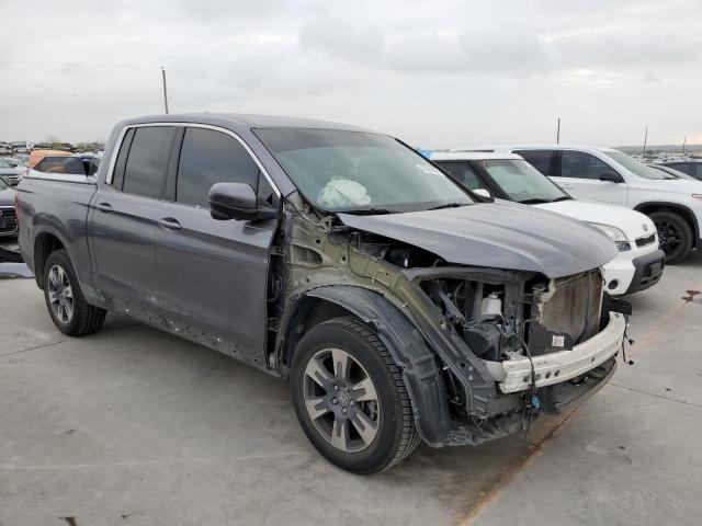 Photo 4 from auction – 2018 HONDA RIDGELINE with VIN 5FPYK3F60JB000388