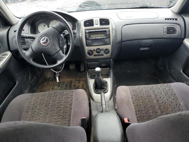 Photo 8 from auction – 2002 MAZDA PROTEGE PR with VIN JM1BJ245521545938