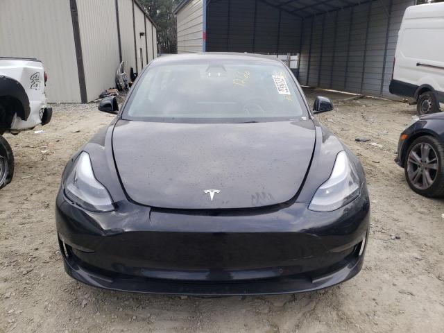 Photo 5 from auction – 2021 TESLA MODEL 3 with VIN 5YJ3E1EA2MF094539