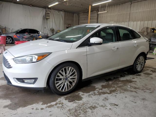 FORD FOCUS TITA 2016 with VIN 1FADP3J28GL274463 - Photo from auction