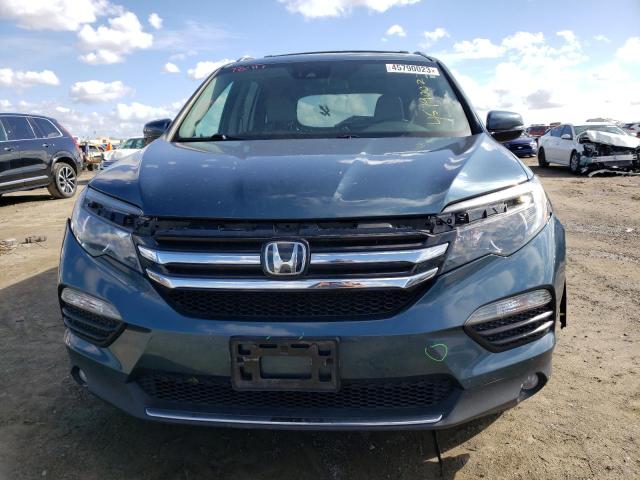 Photo 5 from auction – 2016 HONDA PILOT ELIT with VIN 5FNYF6H01GB028653