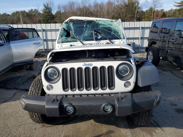 Photo 5 from auction – 2014 JEEP WRANGLER U with VIN 1C4BJWDG6EL207658