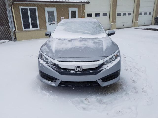 Photo 5 from auction – 2016 HONDA CIVIC EX with VIN 2HGFC2F71GH015664