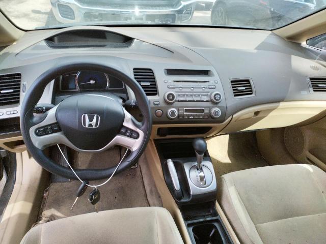 Photo 8 from auction – 2006 HONDA CIVIC HYBR with VIN JHMFA36226S025205
