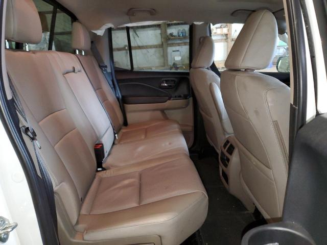 Photo 10 from auction – 2020 HONDA RIDGELINE with VIN 5FPYK3F76LB012346