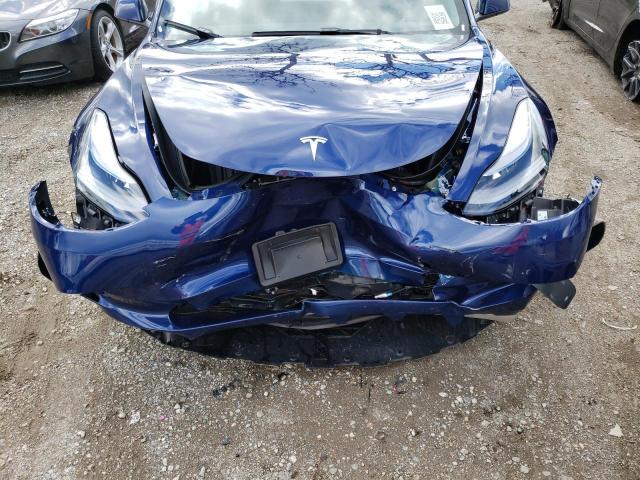 Photo 12 from auction – 2023 TESLA MODEL 3 with VIN 5YJ3E1EA6PF450382