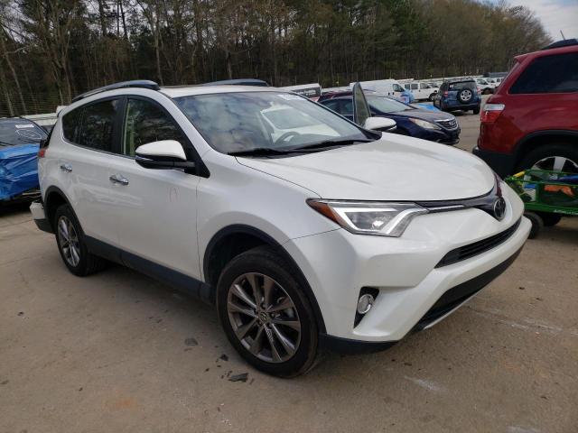 Photo 4 from auction – 2018 TOYOTA RAV4 LIMIT with VIN JTMYFREV7JJ749335