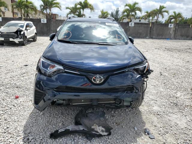 Photo 5 from auction – 2018 TOYOTA RAV4 LE with VIN JTMZFREV1JJ155649