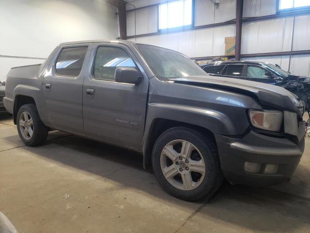 Photo 4 from auction – 2010 HONDA RIDGELINE with VIN 5FPYK1F54AB502476