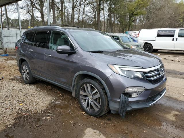 Photo 4 from auction – 2016 HONDA PILOT ELIT with VIN 5FNYF6H02GB014700