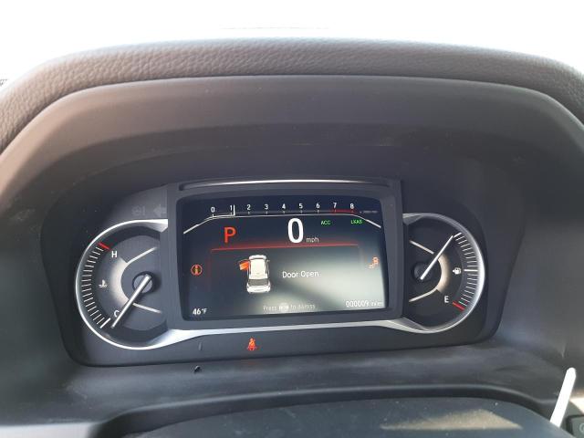 Photo 9 from auction – 2023 HONDA PASSPORT E with VIN 5FNYF8H53PB010548