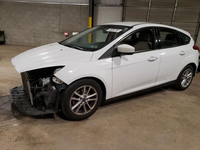 FORD FOCUS SE 2018 with VIN 1FADP3K2XJL213105 - Photo from auction
