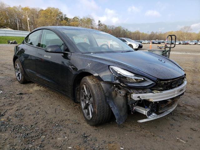 Photo 4 from auction – 2021 TESLA MODEL 3 with VIN 5YJ3E1EA9MF087894
