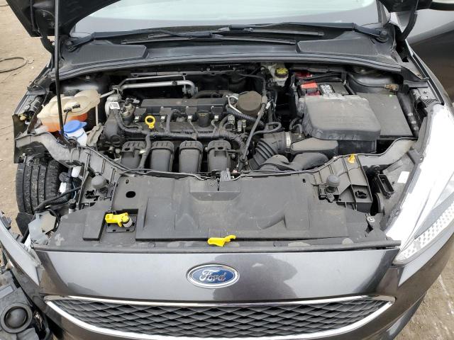 Photo 11 from auction – 2016 FORD FOCUS SE with VIN 1FADP3F28GL220539