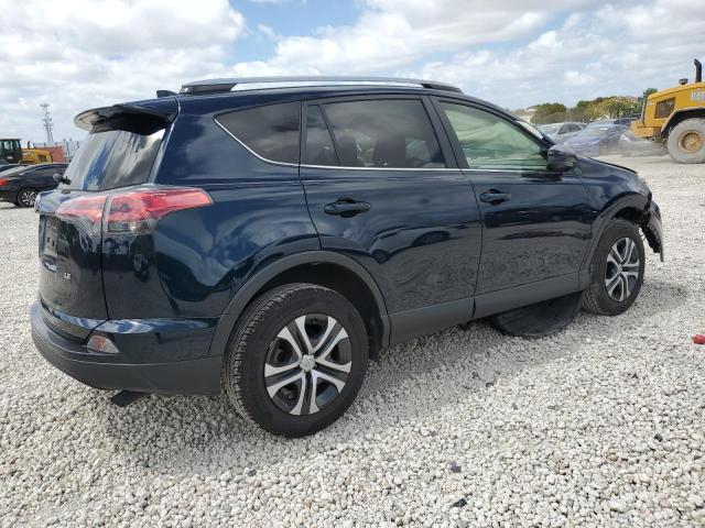 Photo 3 from auction – 2018 TOYOTA RAV4 LE with VIN JTMZFREV1JJ155649