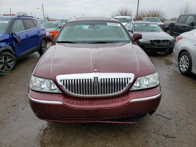 Photo 5 from auction – 2004 LINCOLN TOWN CAR E with VIN 1LNHM81W24Y609988