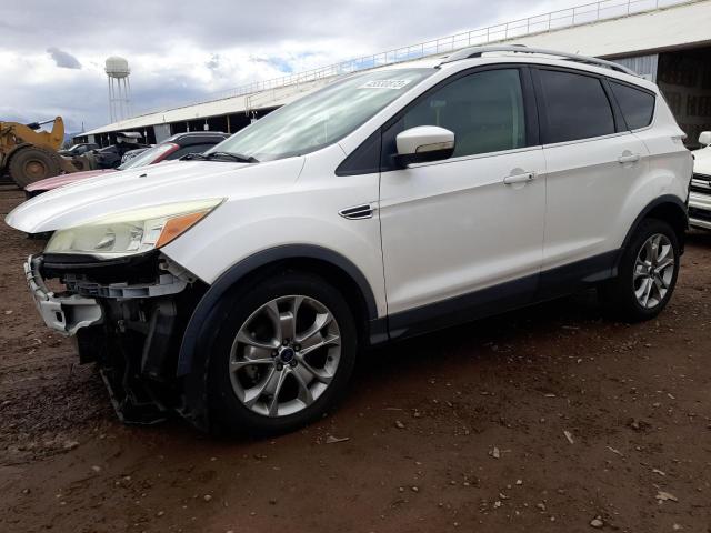 FORD ESCAPE TIT 2014 with VIN 1FMCU0JXXEUB01670 - Photo from auction