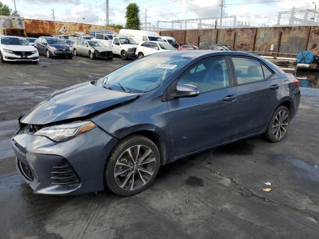 TOYOTA COROLLA L 2018 with VIN 5YFBURHE8JP780435 - Photo from auction