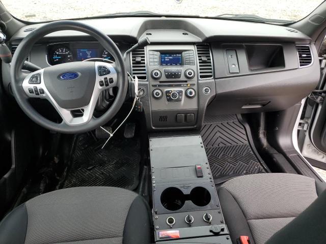 Photo 8 from auction – 2014 FORD TAURUS POL with VIN 1FAHP2MK9EG103220