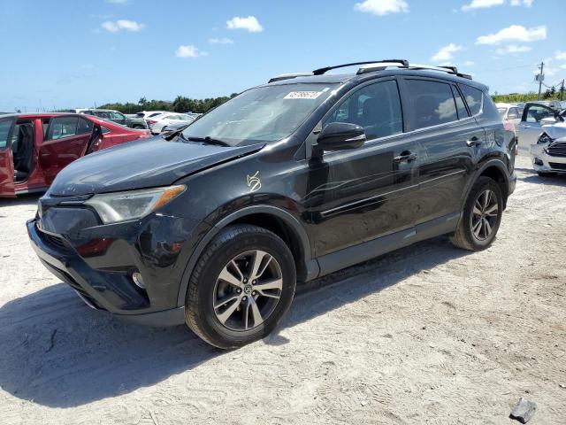 Photo 1 from auction – 2017 TOYOTA RAV4 XLE with VIN 2T3RFREV9HW547533