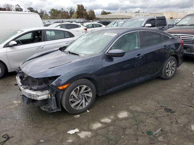 HONDA CIVIC EX 2018 with VIN 2HGFC2F72JH603726 - Photo from auction