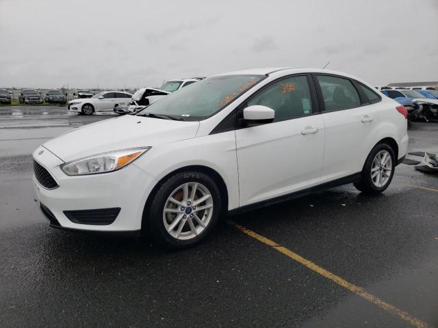 FORD FOCUS SE 2018 with VIN 1FADP3F28JL271191 - Photo from auction