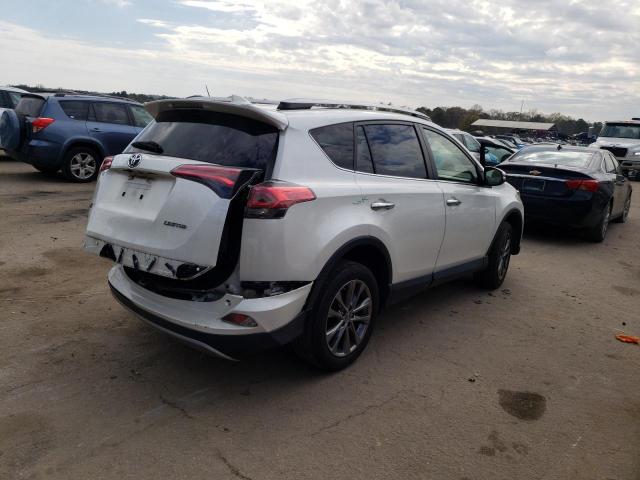 Photo 3 from auction – 2018 TOYOTA RAV4 LIMIT with VIN JTMYFREV7JJ749335