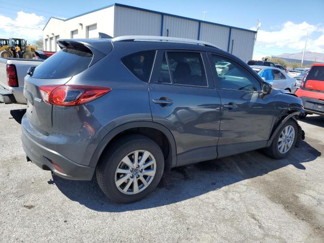 Photo 3 from auction – 2016 MAZDA CX-5 TOURI with VIN JM3KE2CY8G0811389