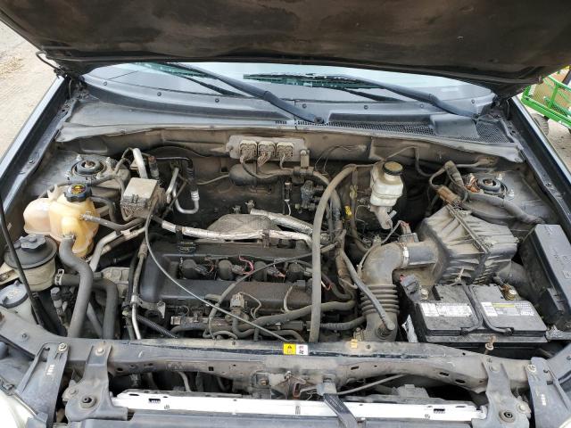 Photo 12 from auction – 2006 MAZDA TRIBUTE I with VIN 4F2YZ02Z86KM21403