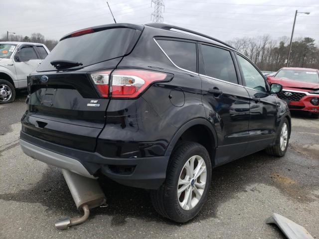 Photo 3 from auction – 2018 FORD ESCAPE SE with VIN 1FMCU9GD0JUC54330