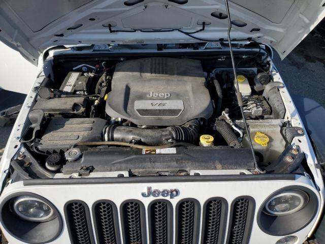 Photo 11 from auction – 2014 JEEP WRANGLER U with VIN 1C4BJWDG6EL207658
