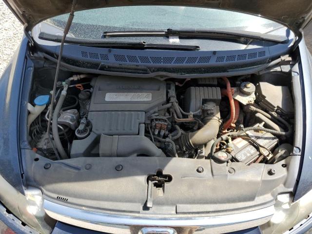 Photo 11 from auction – 2006 HONDA CIVIC HYBR with VIN JHMFA36286S012412