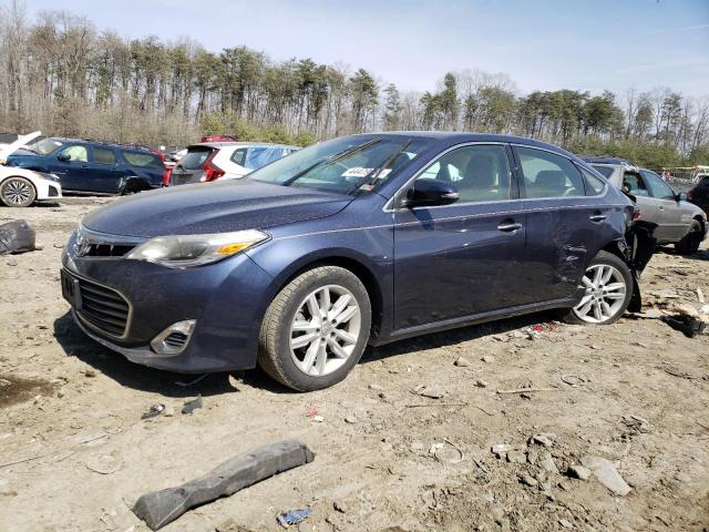 TOYOTA AVALON 2014 with VIN 4T1BK1EB4EU124142 - Photo from auction