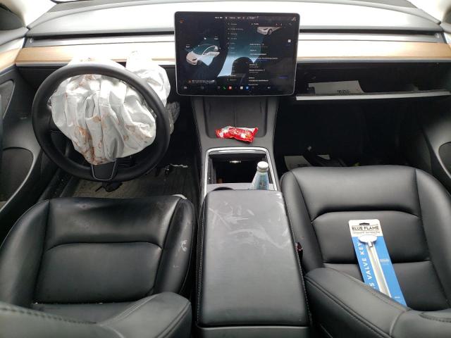 Photo 8 from auction – 2021 TESLA MODEL 3 with VIN 5YJ3E1EA5MF998465