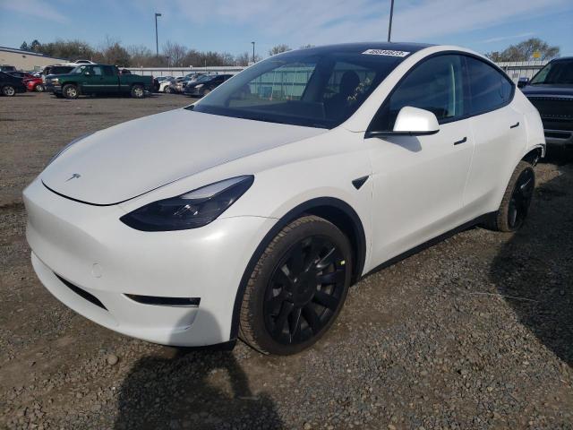 TESLA MODEL Y 2023 with VIN 7SAYGDEE5PF694256 - Photo from auction