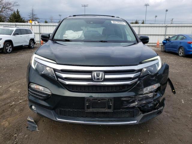 Photo 5 from auction – 2016 HONDA PILOT ELIT with VIN 5FNYF6H04GB090354