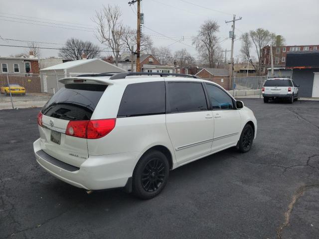 Photo 4 from auction – 2010 TOYOTA SIENNA XLE with VIN 5TDYK4CC7AS310171