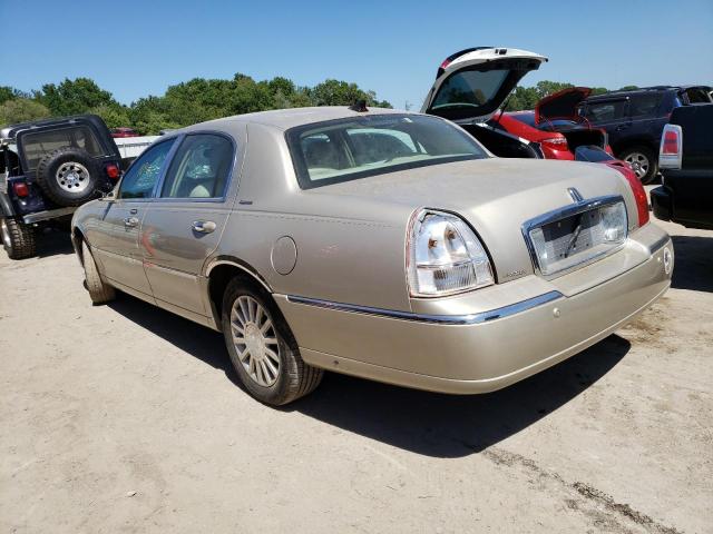 Photo 2 from auction – 2004 LINCOLN TOWN CAR E with VIN 1LNHM81W04Y603736