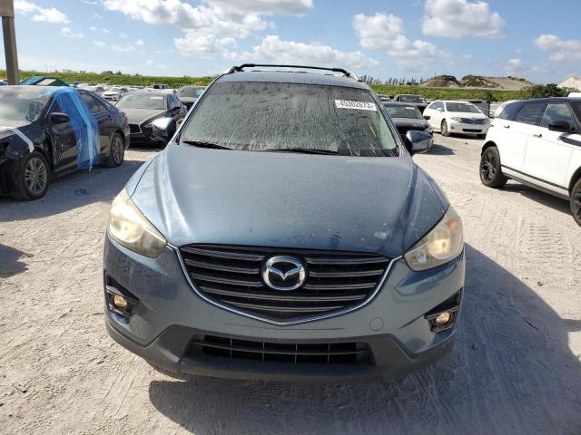 Photo 5 from auction – 2016 MAZDA CX-5 TOURI with VIN JM3KE2CY8G0651062