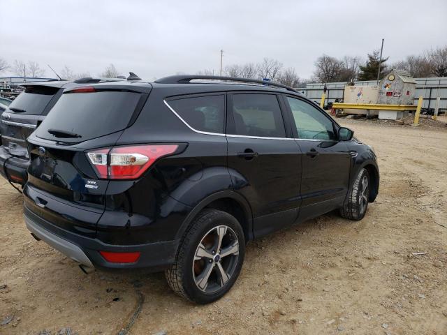 Photo 3 from auction – 2018 FORD ESCAPE SEL with VIN 1FMCU9HD0JUA28707