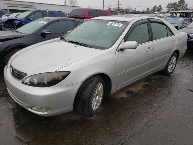 TOYOTA CAMRY LE 2003 with VIN 4T1BE32K83U663254 - Photo from auction