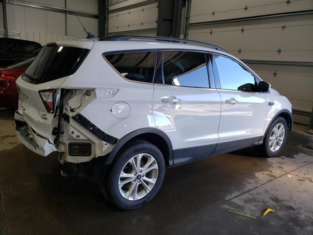 Photo 3 from auction – 2018 FORD ESCAPE SE with VIN 1FMCU9GD4JUD50977
