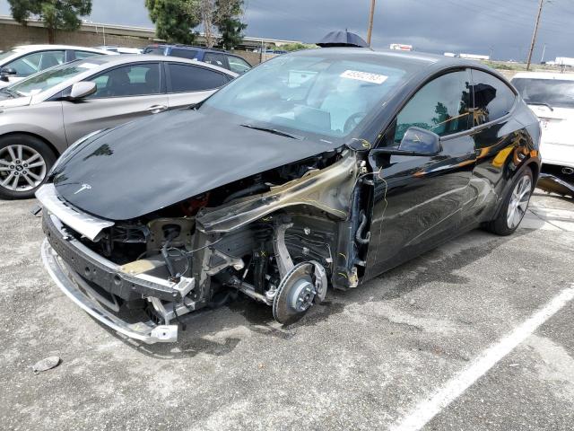 TESLA MODEL Y 2021 with VIN 5YJYGDEE4MF152560 - Photo from auction