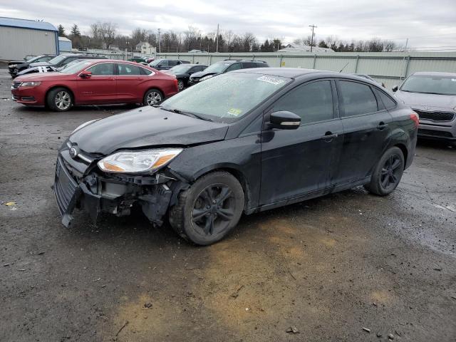 FORD FOCUS SE 2014 with VIN 1FADP3F25EL415852 - Photo from auction