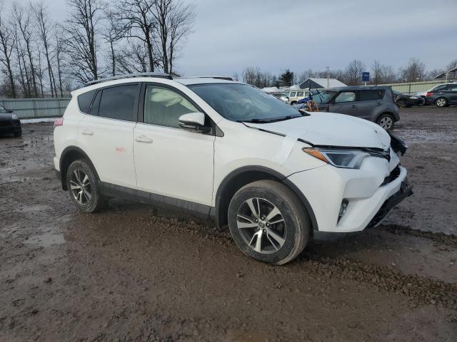 Photo 4 from auction – 2017 TOYOTA RAV4 XLE with VIN JTMRFREV7HJ710856
